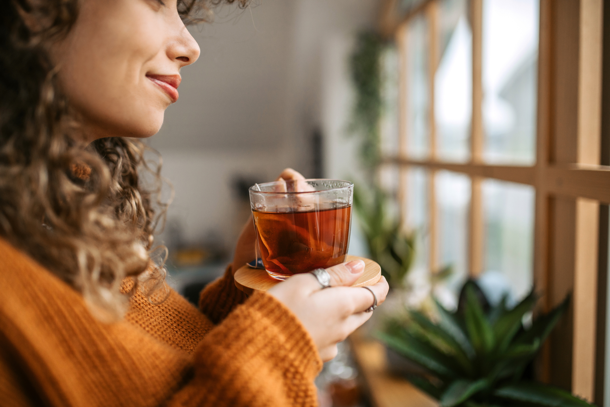 Enjoying in a cup of tea.